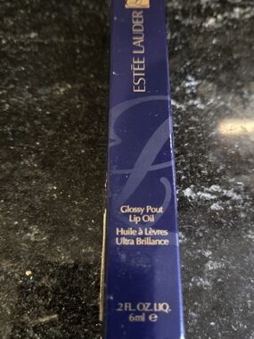 Estee Lauder Glossy Pout Lip Oil. Color Rose Water